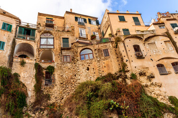 scenic travel landscape of beautiful historic town Tropea in Italy with old antique buildings,...