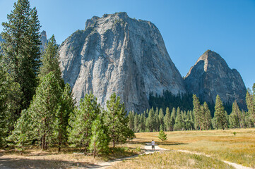 Middle Cathedral Rock and Yosemite Valley in Yosemite National Park during September in California. Formed in 1890 this is one of the oldest and most famous National Parks in the United States. - 764041562