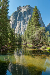 Middle Catheral Rock and Yosemite Valley in Yosemite National Park during September in California. Formed in 1890 this is one of the oldest and most famous National Parks in the United States. - 764041564
