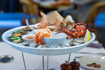 seafood platter with prawns shrimp crabs Balmain bugs oyster clams in a Sydney CBD restaurant NSW...