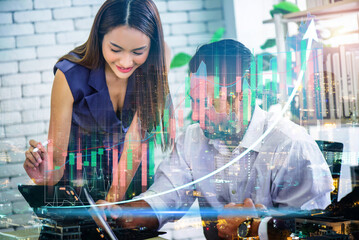Double exposure of stock market graph and business woman working on laptop computer at office. financial stock exchange marketing concept.	 - 764056194