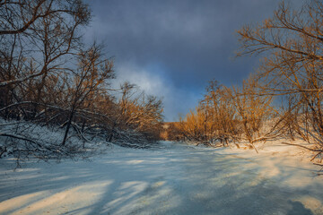winter nature in the Russian countryside at sunset