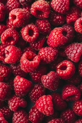 A pile of raspberries top view image. Generative AI.