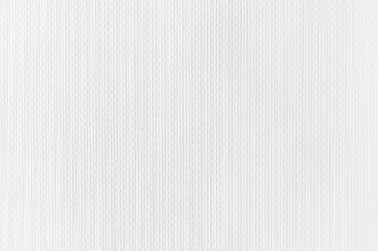 texture of vinyl non-woven banner fabric, white textured background.