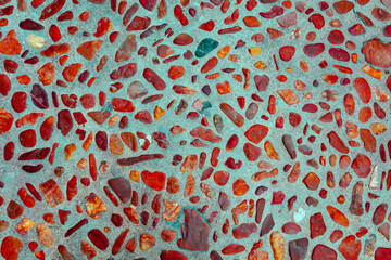 Abstract nature sea pebbles background. Red pebbles in a concrete background. Stone background. Red green vintage color. - 764067925