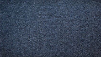 A sheet of black cardboard texture as background