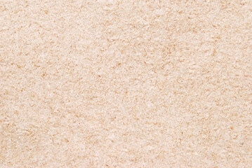 A sheet of beige recycled craft paper texture as background