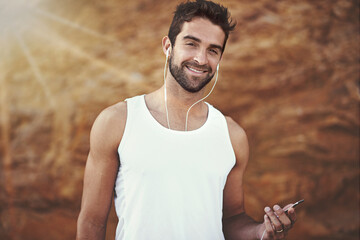 Fitness, headphones and portrait of man with phone for training, exercise and music for workout. Male person, earphones and face with happiness for online streaming, podcast and morning cardio