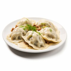 Polish dumplings - pierogi filled with ground meat and cabbage served on white plate, Polish...