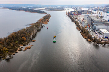 Ship on the Odra River in Szczecin. River transport from a drone.