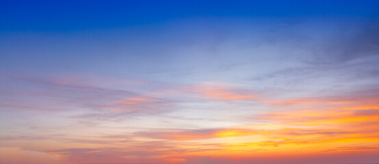 Morning clouds and sky,Panorama sunset sky and cloud background,Orange sky and clouds background,Background of colorful sky concept, amazing sunset with twilight sky and clouds