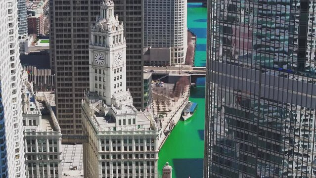 Skyline Spectacular: St. Patrick's Day 2024 in Chicago - Aerial View featuring Wrigley Building