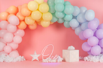 
pink photo background with rainbow balloons