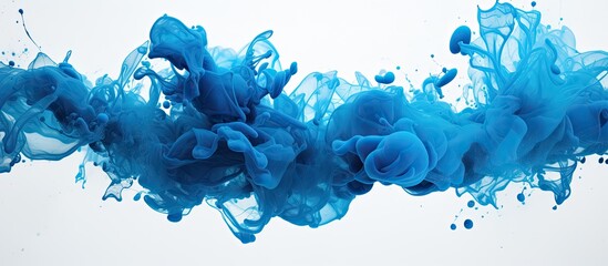A detailed view of a blue substance dispersing and swirling in clear water, creating a mesmerizing...