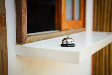 A metal service ringing bell that placed on the cafe counter or receiption desk. Object photo....