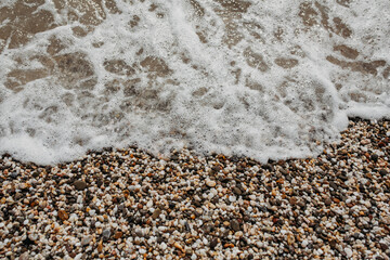 Sea rocks and wave close-up, sea shore