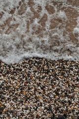 Sea rocks and wave close-up, sea shore