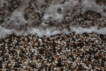 Sea rocks and wave close-up, sea shore