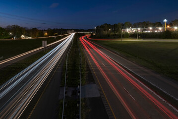 Fototapeta na wymiar Car trails on a Freeway at the blue hour