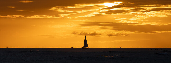Sailboats during a hawaiian sunset