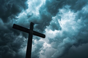 Dramatic scene of a cross silhouette with thunderstorm clouds in the background, symbolizing hope amidst adversity. - obrazy, fototapety, plakaty