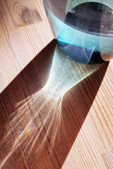 A Glass of Water on a Wooden Table