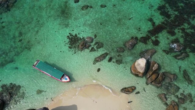 Belitung beach and islands drone view. Beautiful aerial view of islands, boat, sea and rocks in Belitung, Indonesia 