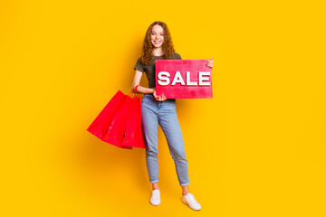 Photo of cheerful glad girl dressed stylish clothes girl advertising seasonal sale total offer...
