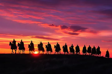 Keuken spatwand met foto Silhouette of Roman cavalry on a scouting mission through rolling hills at dawn. © furyon