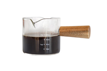Measuring cup with wooden handle on white background