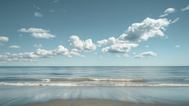 Gazing from the empty shore, witness the boundless meeting of sky and sea at the unending Pacific horizon.