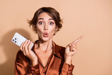 Photo of funny impressed lady dressed brown shirt texting instagram twitter telegram facebook empty...