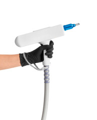 The hand of a cosmetologist holds a laser manipulator with a nozzle for tattoo removal