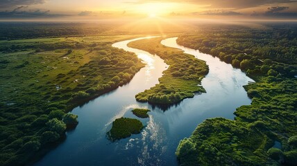 Golden hour over meandering rivers cutting through lush wetlands