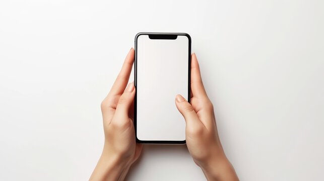 Person holds up a smartphone with a blank white screen