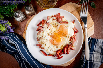 Fried egg and sliced sausage.