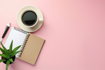 notebook and cup of coffee mockup pastel pink background