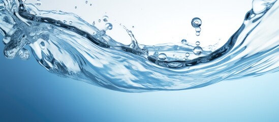 A detailed view of a water wave set against a blue background