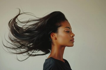 young woman model mixed race demonstrating luxury hairstyle