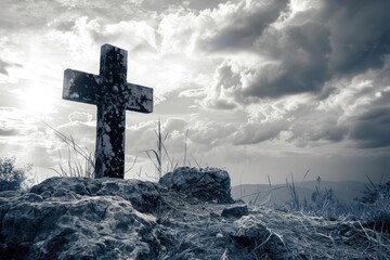 Religious Christian banner of a black and white wooden cross on rock hilltop with copy space