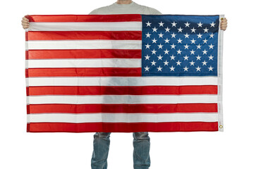 Person holding an american flag in front of a white background