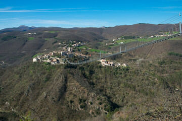 Beautiful view of a tibetan bridge in the medieval town of Sellano in the heart of Valnerina, Umbria region, Italy - 764188546