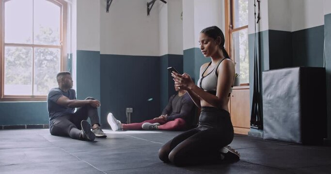  Three young diverse students getting ready for fitness class