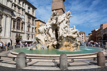 Fountain of the Four Rivers with an Egyptian obelisk in Piazza Navona.Rome, Italy. - 764191599