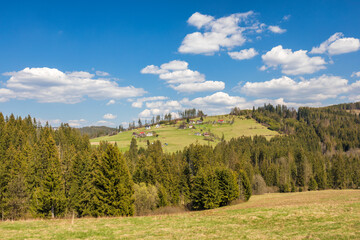A mountainous landscape with villages on the hills in the south of Poland, Europe.
