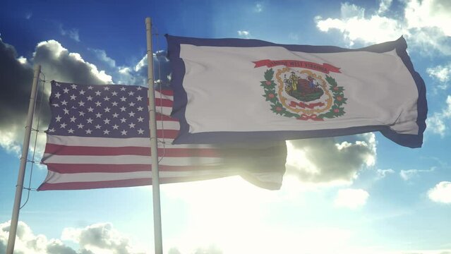 The West Virginia state flags waving along with the national flag of the United States of America. In the background there is a clear sky
