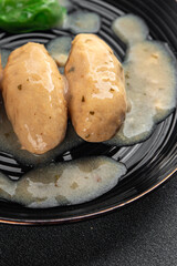 quenelles pork mushroom sauce canned food jar put food on a plate eating cooking appetizer meal food snack on the table copy space food background