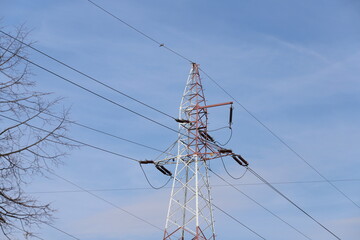 High voltage pole. City electricity. High voltage lines.