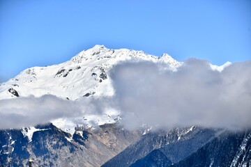 Cloud in front of Mont Blanc mountain in winter 