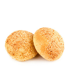 Buns with sesame seeds isolated on a white. Free space for text.
